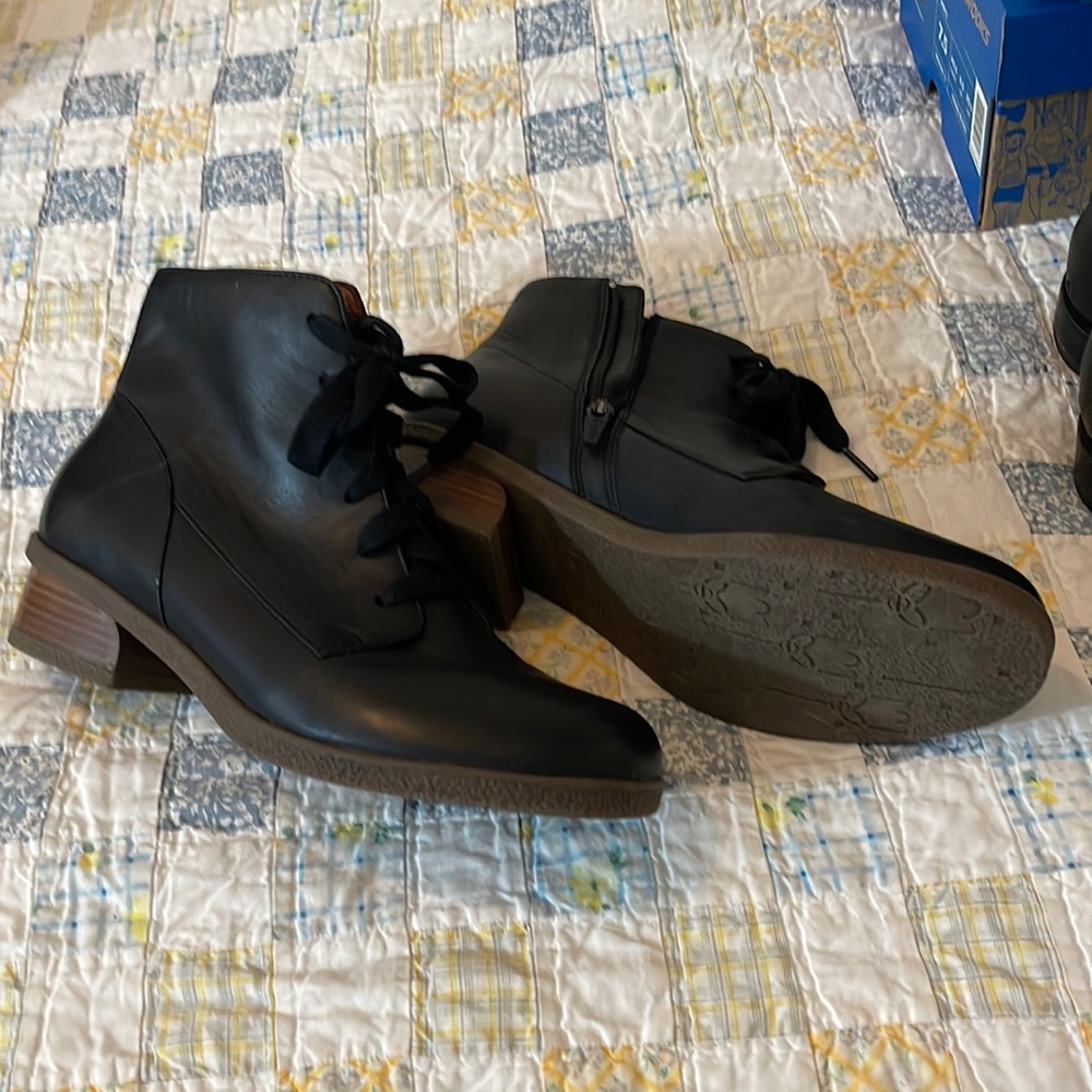 Dansko lace up bootie with inside zipper for easy on/off. Black  Like new.